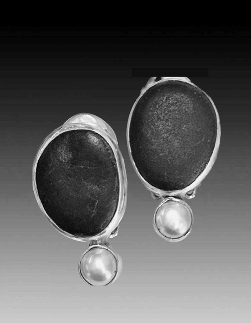 These Echo of the Dreamer earrings feature black river stones, white pearls set in sterling silver 1.25 x 1"  Clips only.