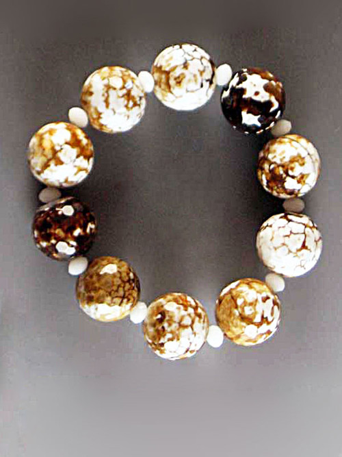 Faceted multi-jasper balls in tones of white, bronze, gold and brown with Alabaster Swarovski crystals.  Stretches to 8"