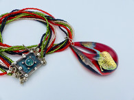 Brilliantly colored dichroic Venetian Pendant with matching torsade 