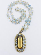 24ct Sterling Silver Citrine Pendant framed in Blue Topaz with a wire wrapped chain