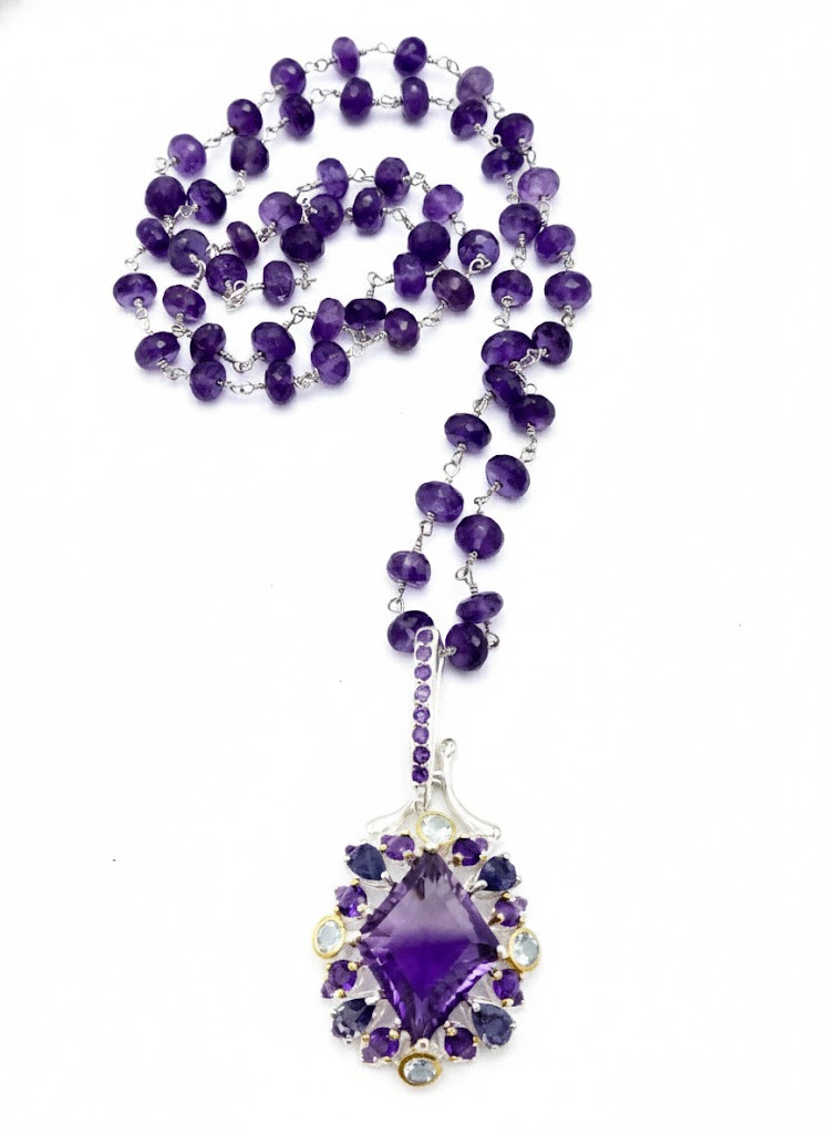 Diamond Shape faceted Amethyst Pendant framed with Precious Stones