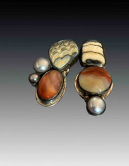 Echo of the dreamer Asymmetrical fossil shell, carnelian, pearl clip earring 