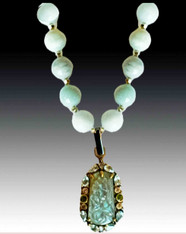 You'll make a statement with this stunning large Burmese Jade necklace with a hand carved 25ct labradorite pendant surrounded by precious jewels and 24K vermeil flowers.   18"
