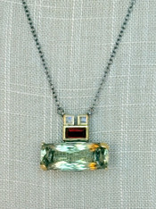 40 ct Natural Green and Wine Garnet with white Topaz on a Rhodolite Sterling Chain