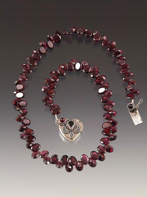 Have a heart---in this case a 17" Grade AA sparkling rhodolite garnet necklace centered with a vintage sterling garnet heart clasp.