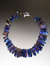 A website best buy with amazing impact!  An 18" collar of iridescent cobalt natural quartz with tones of silver and pale blue with custom sterling clasp. Also available in 19.5"