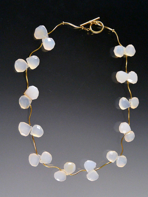 This delicate collar features grade AAA natural chalcedony with 14K vine tubes and a 14K toggle clasp