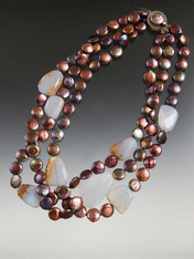A bold statement for any occasion -- large facetednatural raw chalcedony slices float on a sea of brown coin pearl strands with a Peruvian mabe pearl custom clasp that can be a side or center station.  20"