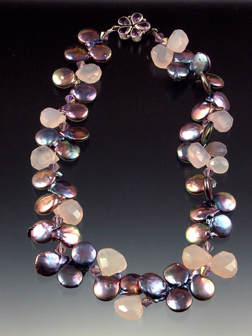A showstopper with fabulous color, dramatic dimensions, and amazing quality!  A very limited quantity of 14-16mm high-luster peacock pearls with raw chalcedony teardrops, lilac Swarovski crystals, and a sterling amethyst flower clasp. 17-/2" 
