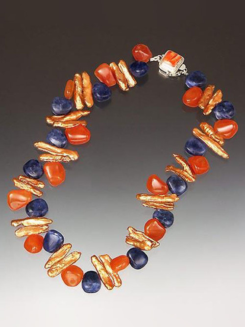  Colorful blue sodalite, carnelian, sienna stick pearls and sterling spondylus clasp necklace.