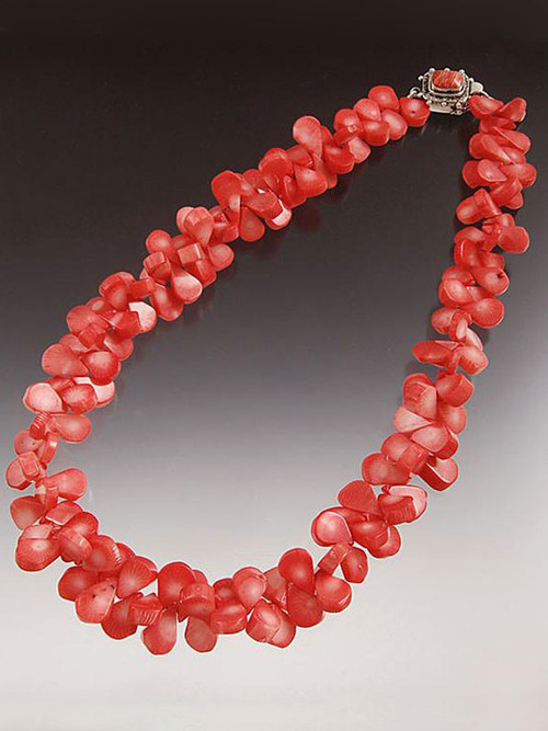 Make a dramatic statement wearing this  peach coral collar!