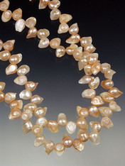 A fabulous freeform raw pink pearl necklace.