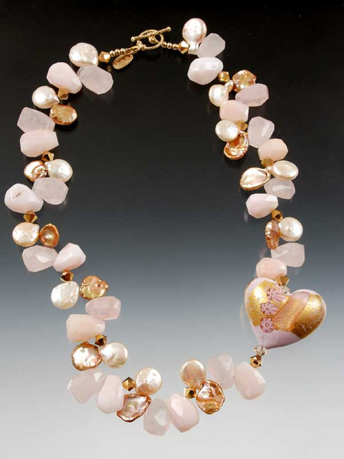 A fantasic limited edition 24K 1-1/2" Zanfirico* puffed heart is the focal point of this luxurious collar glowing with pink opal, rose quartz, pink freshwater pearls, rare rose gold petal pearls, 24K plated Swarovski crystals and a 14K cast spiral toggle clasp from years ago (now worth as much as the whole necklace)