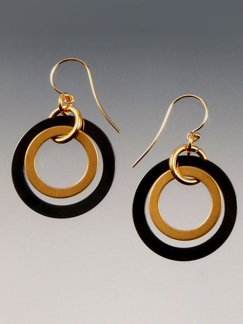 These double hoop earrings in gunmetal and 24K brushed gold overlay with 14K earwires are totally trendy and go with everything. 