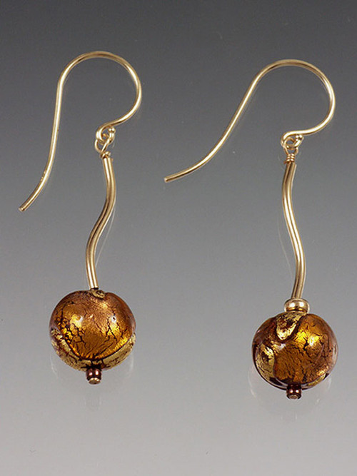 Perfect match for Golden Globe necklaces. Super elegant with lots of real gold. 24K topaz Venetian glass globes dangle from a curved 14K tube. Select 14K earwire or post and topaz (shown), red, cobalt, or aqua.