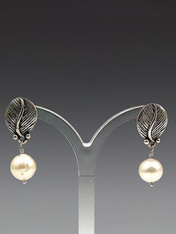Absolutely charming. Sterling feather post with grade AAA 10mm white freshwater pearl - 1"