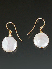 Grade AAA opulent 16mm white coin pearl and 14K rondel dangle from a 14K earwire or post.  