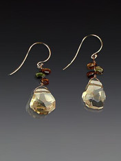 One of our most popular designs and very limited, these elegant earrings feature Grade AA faceted pale citrine drops, tourmaline briolettes, and 14K earwires.