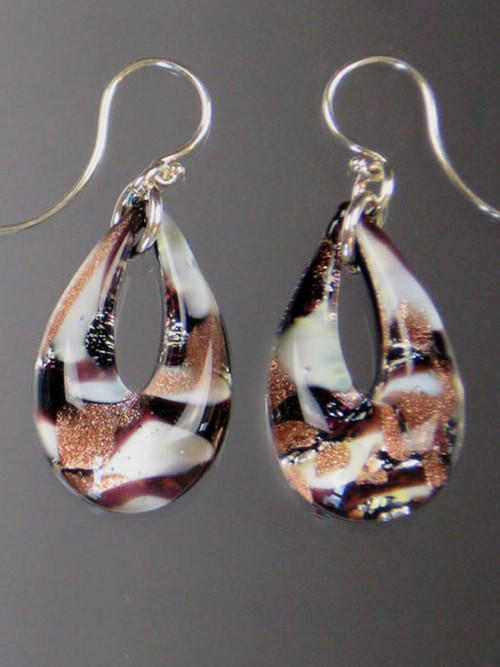 These teardrop earrings feature authentic Murano Glass in a base of black overlaid with silver and white swirls encased in clear glass.  They are rich in color, each one slightly different as they are entirely handmade. The mound of clear Murano Glass over the color give sit a magnified effect. Sterling Silver Earwires. 1-1/2" 