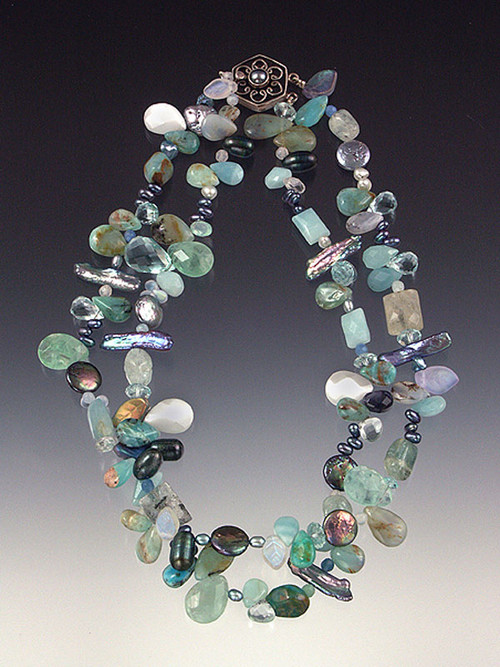 A fantasy of freshwater pearls, aquamarine, Peruvian opal, Swarovski crystals -- each one unique and gorgeous!  18"  - select one-strand or two.