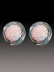 These Amy-Kahn Russell clip earrings feature hand-carved pale pink angelskin coral flowers bezel set in sterling silver
