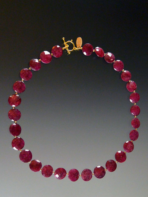 I've been searching for years to find affordable fine quality rubies to replace the two that sold out.  It's almost impossible to find any up to my standard but recently I came upon two gorgeous strands of rich red faceted ruby coins which I designed in a simple classic collar with 18K beads and an 18K toggle clasp. If you are a ruby lover, get these while they're still available. 18" ONLY TWO!