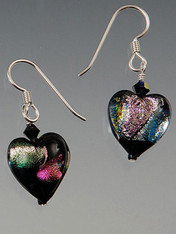 These "decadent" iridescent black/violet shimmering dichroic heart earrings are topped with a Swarovski crystal suspended from sterling earwires.  They're all you need to make a statement 1"