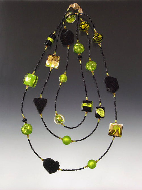 Dramatic black tourmaline, custom lime, gold, white Venetian glass, 24K plated Swarovski crystals and 14K clasp -- a rope to wrap two or three times or wear it long like a flapper! 55”