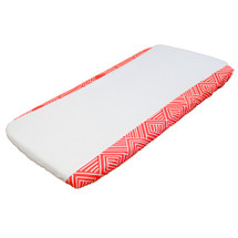 Coral and white change pad cover