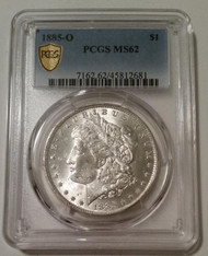 1885 O Morgan Silver Dollar MS62 PCGS Gold Shield Holder