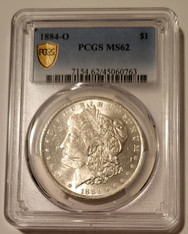 1884 O Morgan Silver Dollar MS62 PCGS Gold Shield Holder