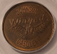 1933-johson-winged-gas-token-au58-icg-c
