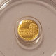 colosseum-nd-gold-token-ms70-icg-c