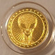 alien-head-gold-token-ms69-pcgs-c