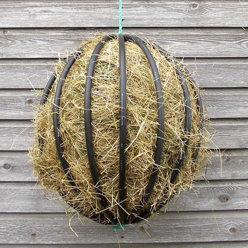 Filling a Hayball is so easy - simply push hay through the flexible bars. You dedice how full you want it.