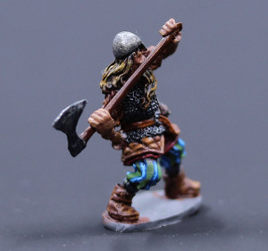 Viking Male chainmail with great axe drawn back to swing