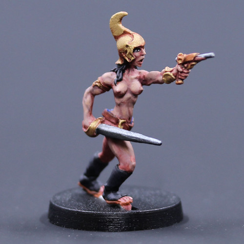 Female Red Man advancing with pistol and sword