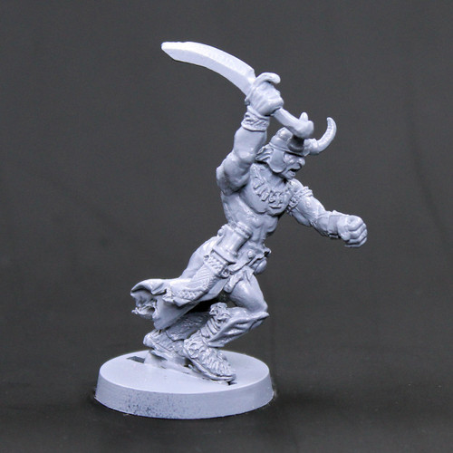 Barbarian with horned helmet attacking with sword