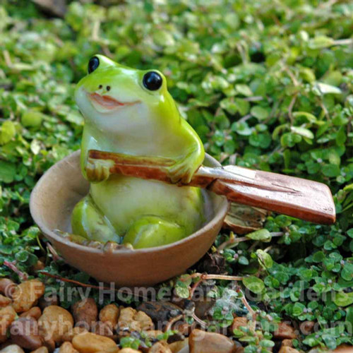 Miniature Froggie Rowing a Boat