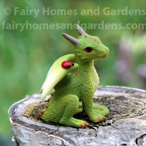 Miniature Green Dragon with Tiny Ladybug on His Shoulder