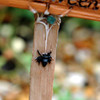 Miniature "Have a Spooky Halloween" Sign Close-Up of Spider