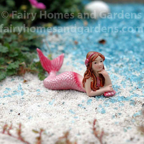 Miniature Mermaid Figurine Wearing Headphones