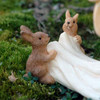 Miniature Bunny Wedding Attendants Holding Train
