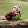Christmas Baby with Green Ornament