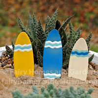Set of 3 miniature surfboards