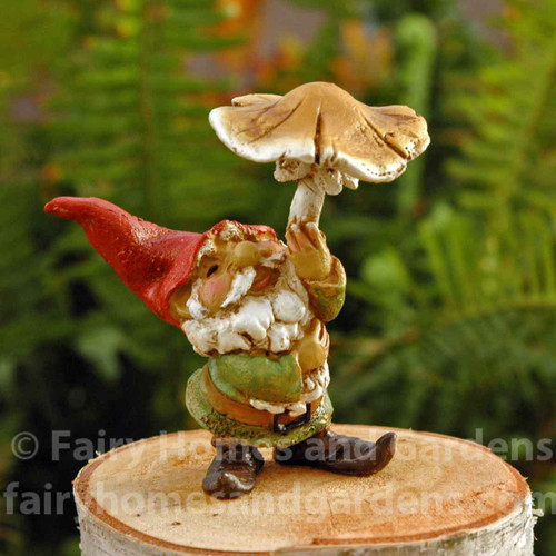 Miniature Gnome with a Pointy Red Hat and Toadstool Umbrella