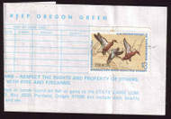#RW38 VF/XF stamp on Oregon license, stamp creased