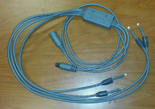 New style shown (square plug)