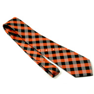 Texas Check Tie
Black, Burnt Orange and White diagonal Bands
White Longhorn Logos Woven Diagonally on Burnt Orange Band
Woven Polyester