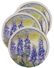 Set of four decorative absorbent coasters from "Thirstystone"
Each 4 1/4" coaster has a cork base to protect furniture